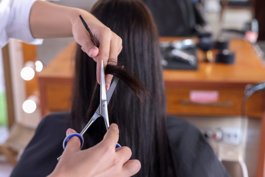 professional hairdresser cutting